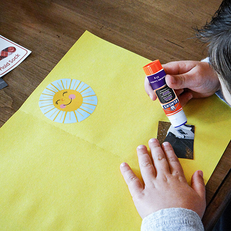 Child Doing Craft With Elmers Glue Stick