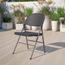 Flash Furniture HERCULES Series 330 lb. Capacity Black Plastic Folding Chair with Charcoal Frame Thumbnail 5